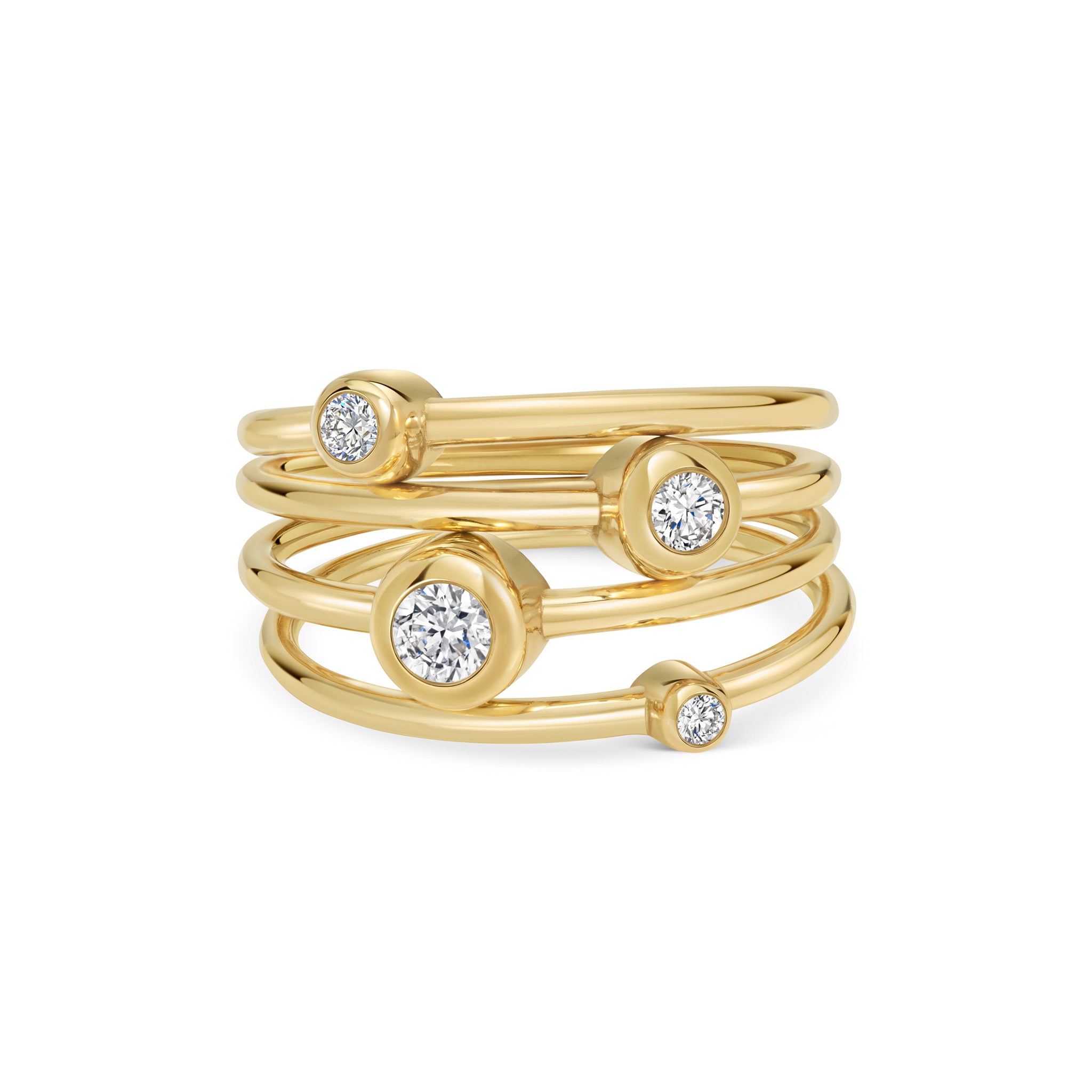 Marina Skia elegant stack of solitaire rings in diamond and 18K yellow gold