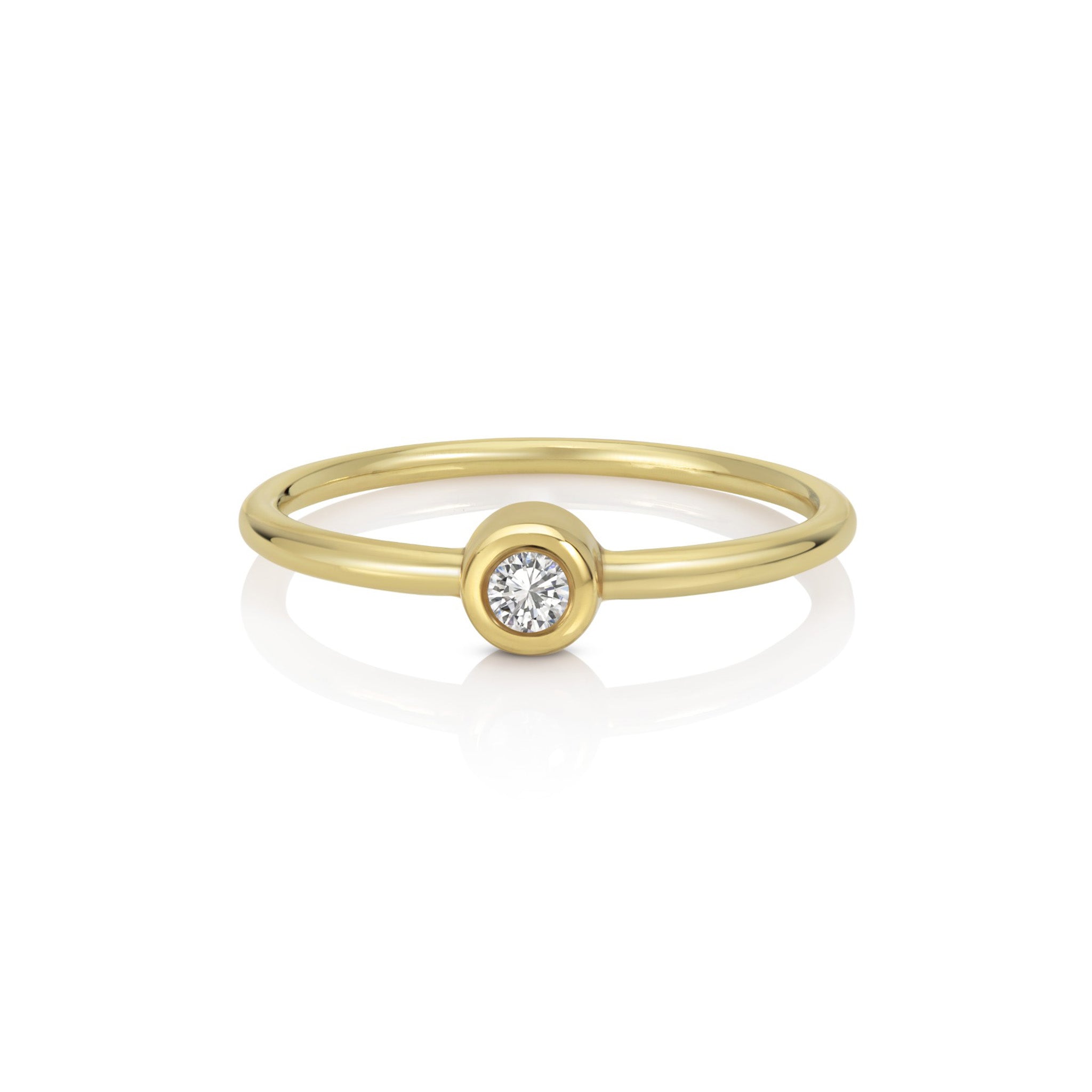 Marina Skia bold solitaire ring in white diamond and high polished yellow gold